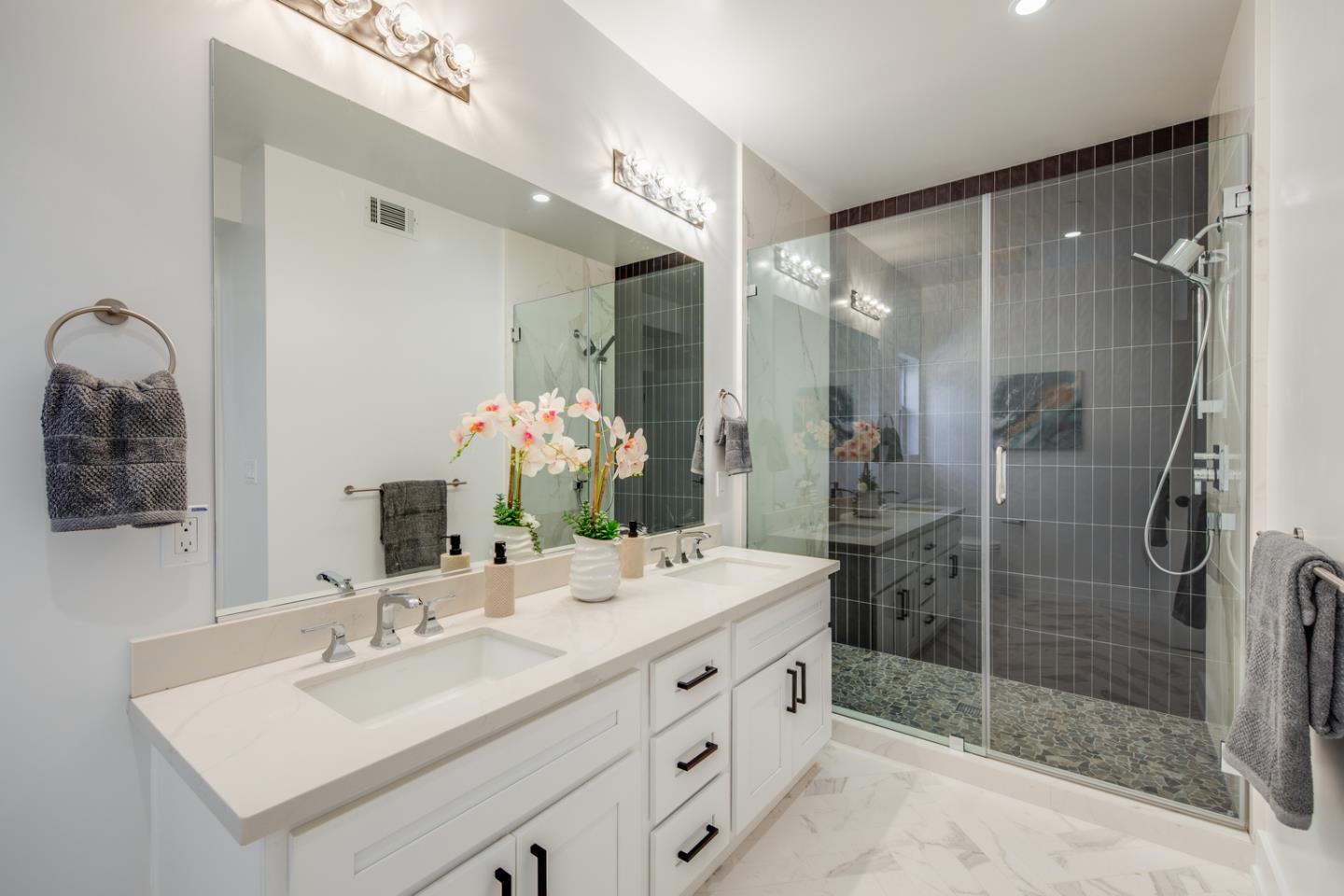 846 Portola Road Portola Valley, CA 94028 - Photo 28 of 80 a bathroom with a shower sink mirror and
