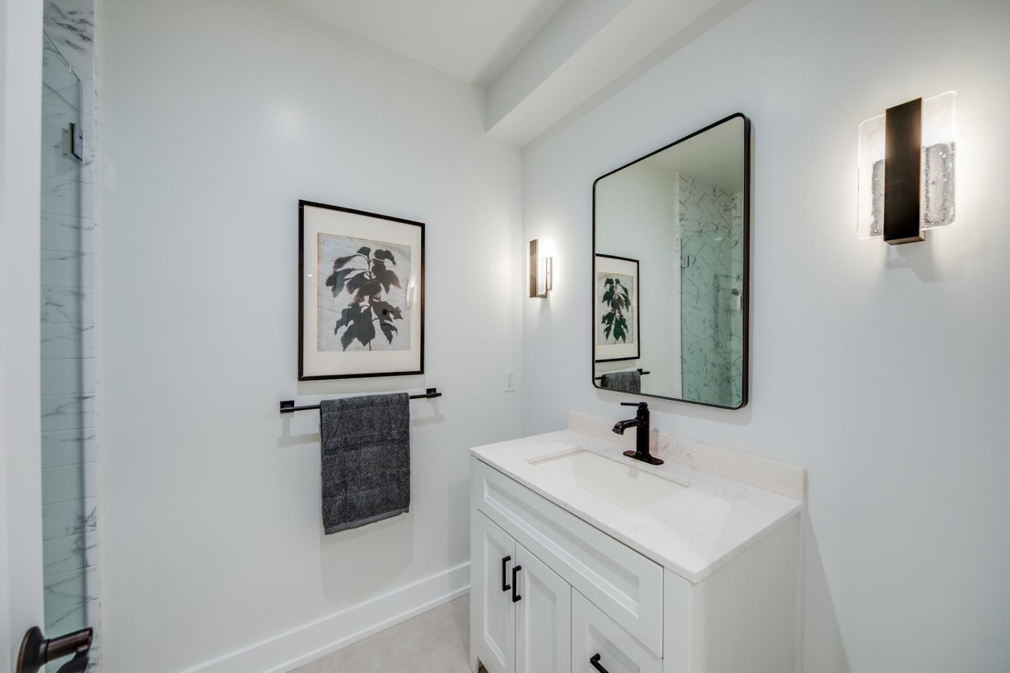 846 Portola Road Portola Valley, CA 94028 - Photo 34 of 80 a bathroom with a sink and a mirror