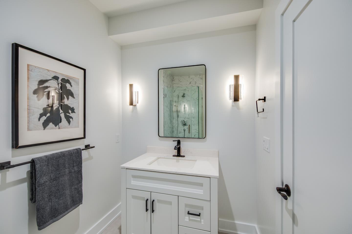 846 Portola Road Portola Valley, CA 94028 - Photo 35 of 80 a bathroom with a sink and mirror