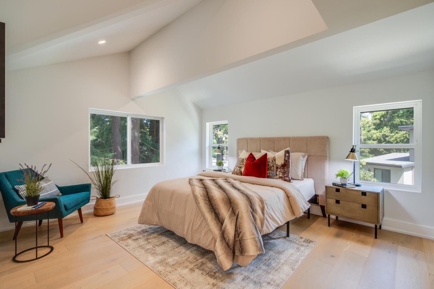 846 Portola Road Portola Valley, CA 94028 - Photo 51 of 80 a bedroom with a bed and a large window
