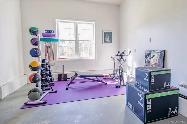 a room with furniture and a window