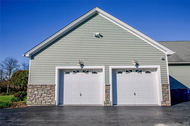 a view of a house with a garage