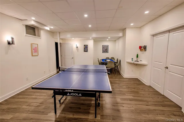 a view of kitchen with furniture and wooden floor