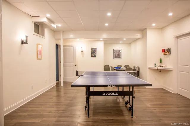 a view of a kitchen with a table and chairs