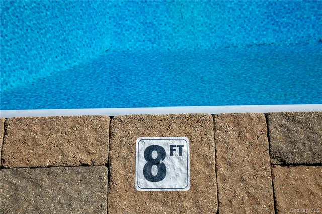 a view of a house with a yard porch and sitting area