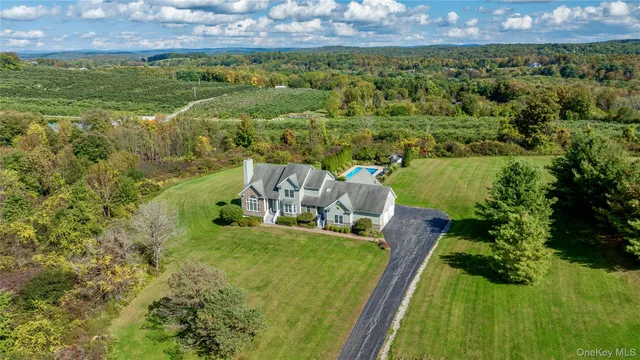 a view of a lake with a house