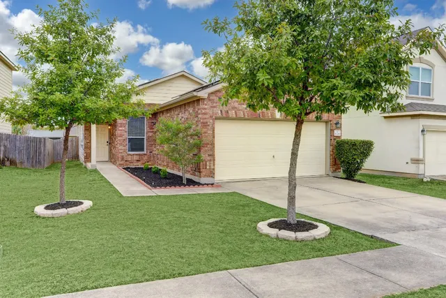 a view of a backyard with a garden
