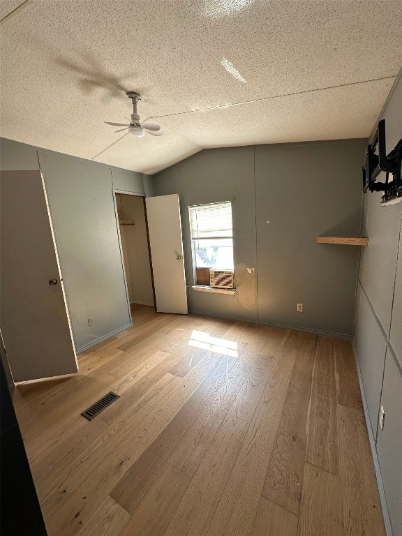 156 Bullfrog Holler Road Dale, TX 78616 - Photo 4 of 10 wooden floor in an empty room with a window