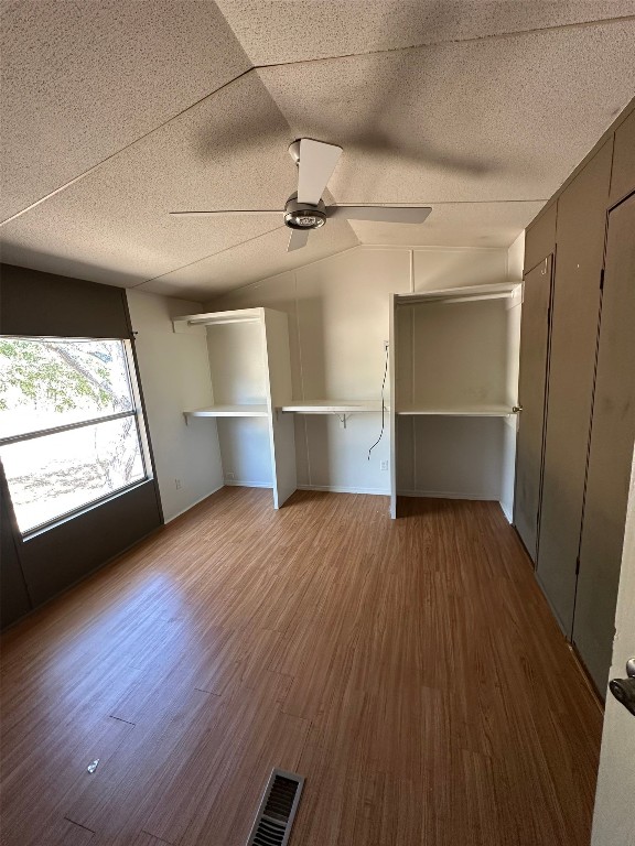 156 Bullfrog Holler Road Dale, TX 78616 - Photo 7 of 10 wooden floor in an empty room with a window
