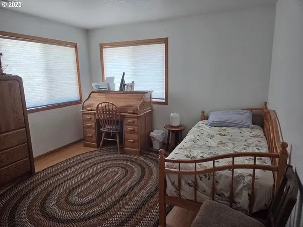a bedroom with a bed and a closet