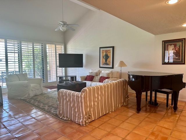 a kitchen with a sink cabinets and window