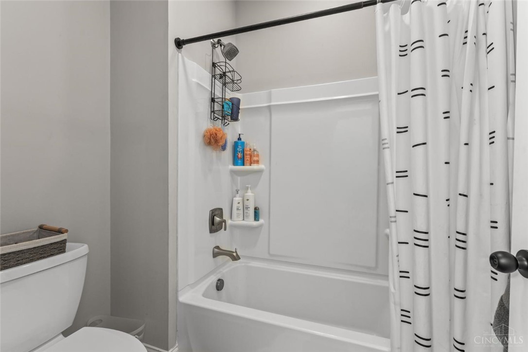 2425 Middleboro Road Clarksville, OH 45113 - Photo 83 of 91 This clean and inviting bathroom features a classic shower-over-tub design with practical fixtures.