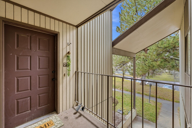 1175 Canyon Road, Unit 77 Ogden, UT 84404 - Photo 10 of 16 Property entrance featuring board and batten siding