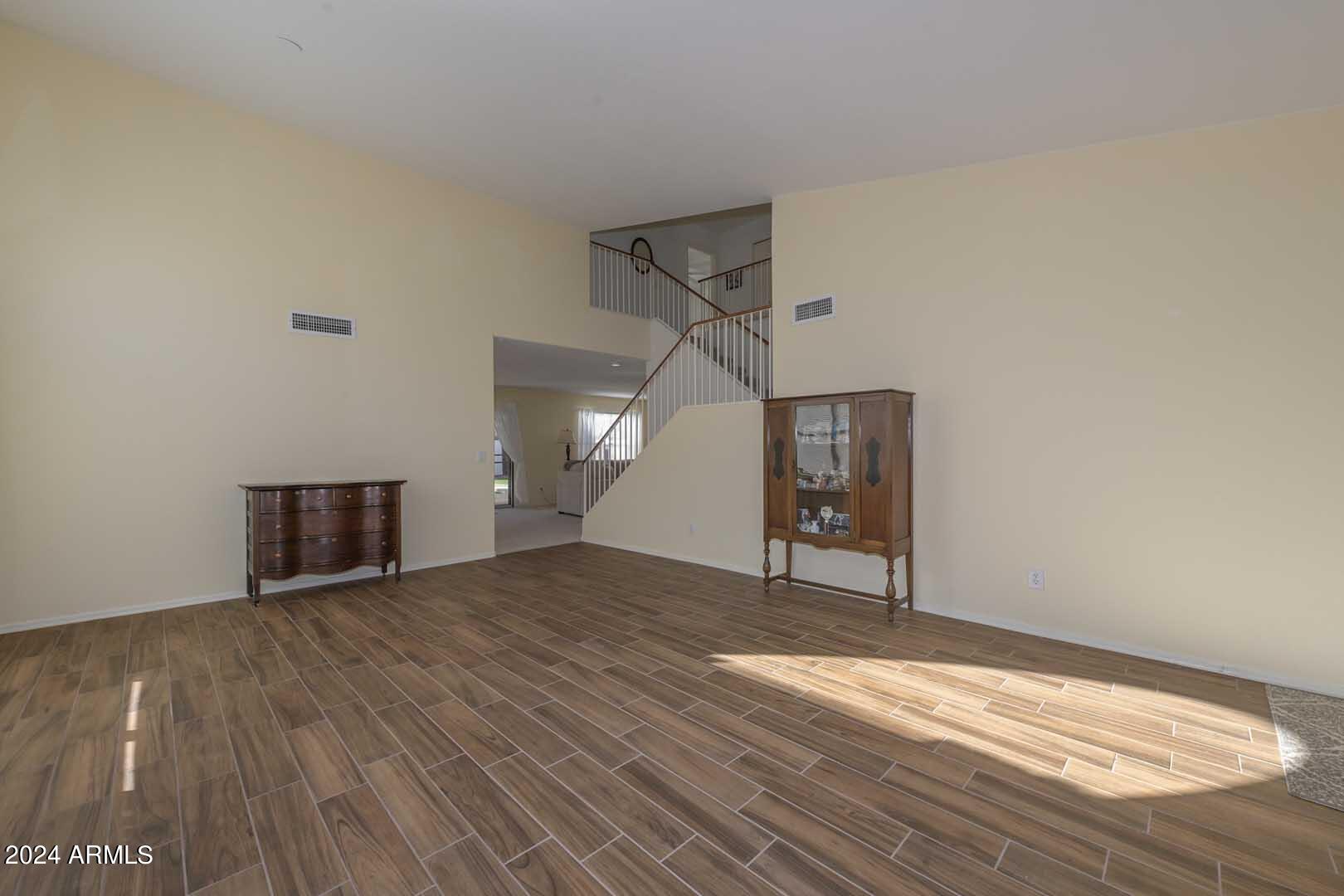 7641 West Boca Raton Road Peoria, AZ 85381 - Photo 5 of 42 Living Room-Staircase