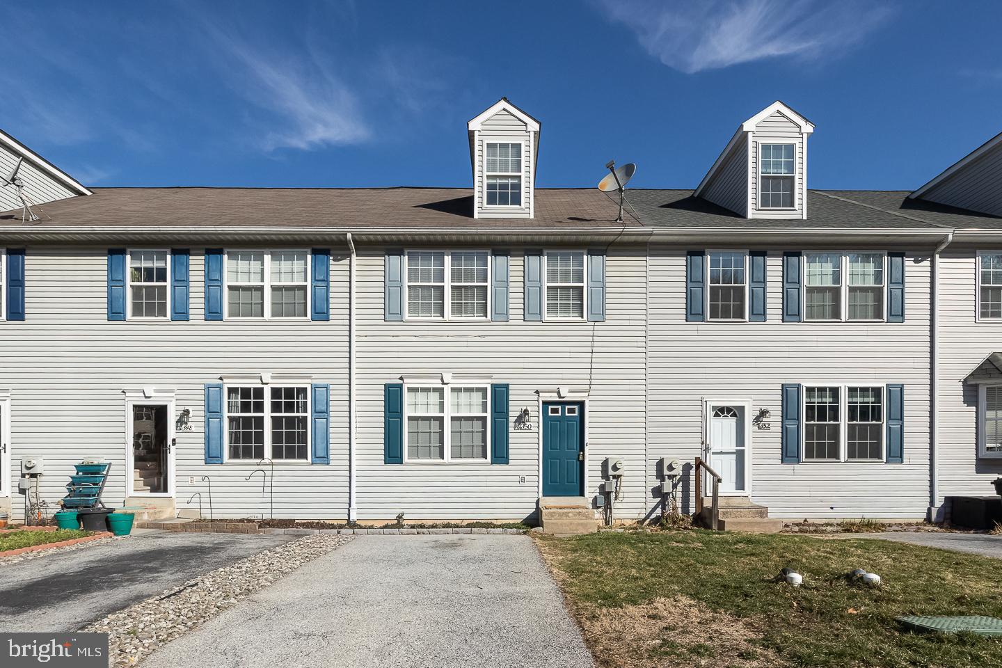 350 Andrew Road Coatesville, PA 19320 - Photo 1 of 20 a front view of a house with a garden