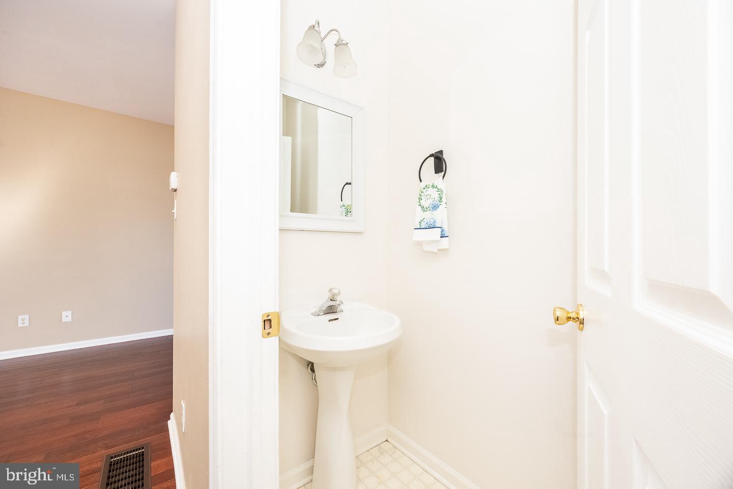 350 Andrew Road Coatesville, PA 19320 - Photo 5 of 20 a bathroom with a sink and mirror
