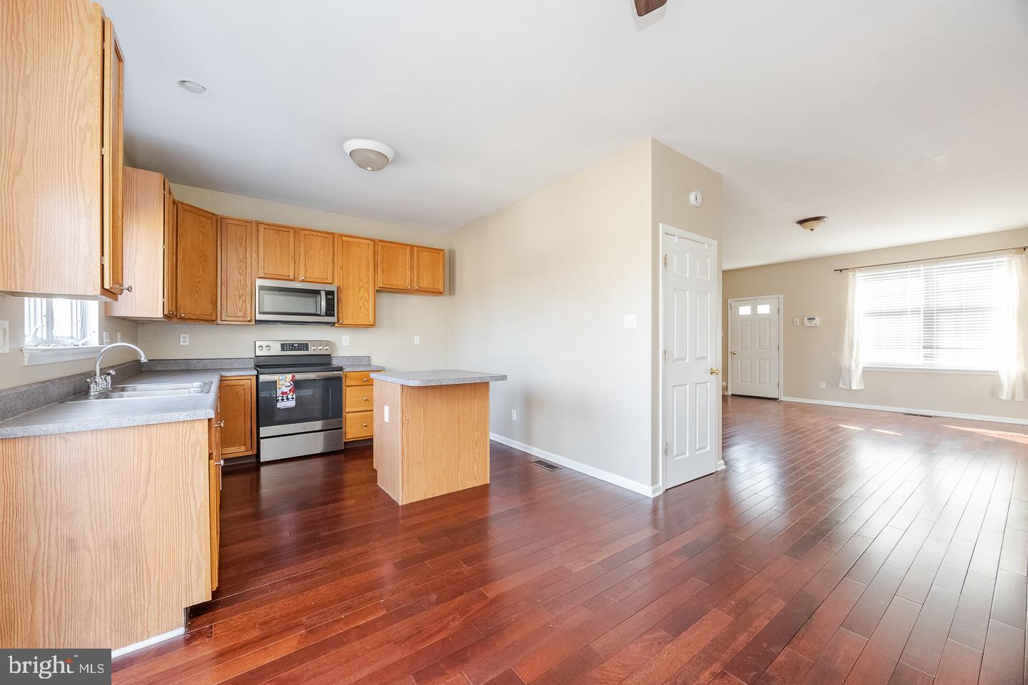 350 Andrew Road Coatesville, PA 19320 - Photo 10 of 20 a kitchen with stainless steel appliances a stove top oven a sink a counter space and cabinets
