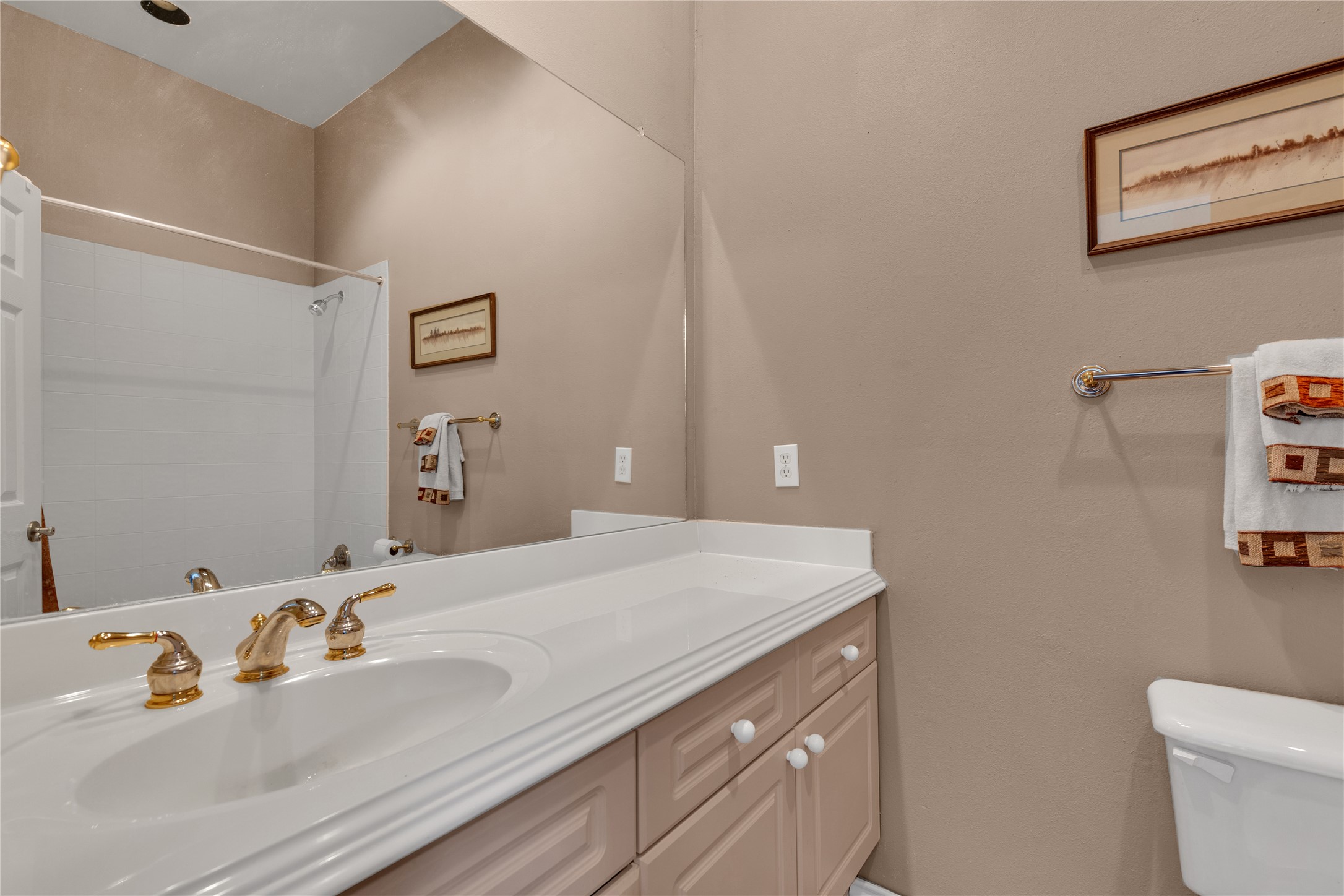2918 Ranch Road 620 North, Unit L173 Austin, TX 78734 - Photo 20 of 35 a bathroom with a sink and a toilet