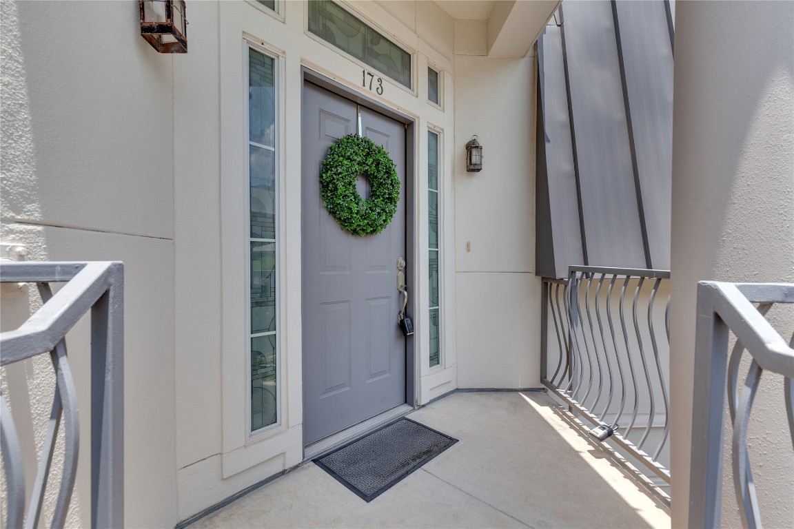 2918 Ranch Road 620 North, Unit L173 Austin, TX 78734 - Photo 22 of 35 Doorway to property featuring stucco siding