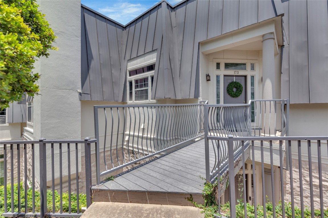 2918 Ranch Road 620 North, Unit L173 Austin, TX 78734 - Photo 23 of 35 Entrance to property with board and batten siding