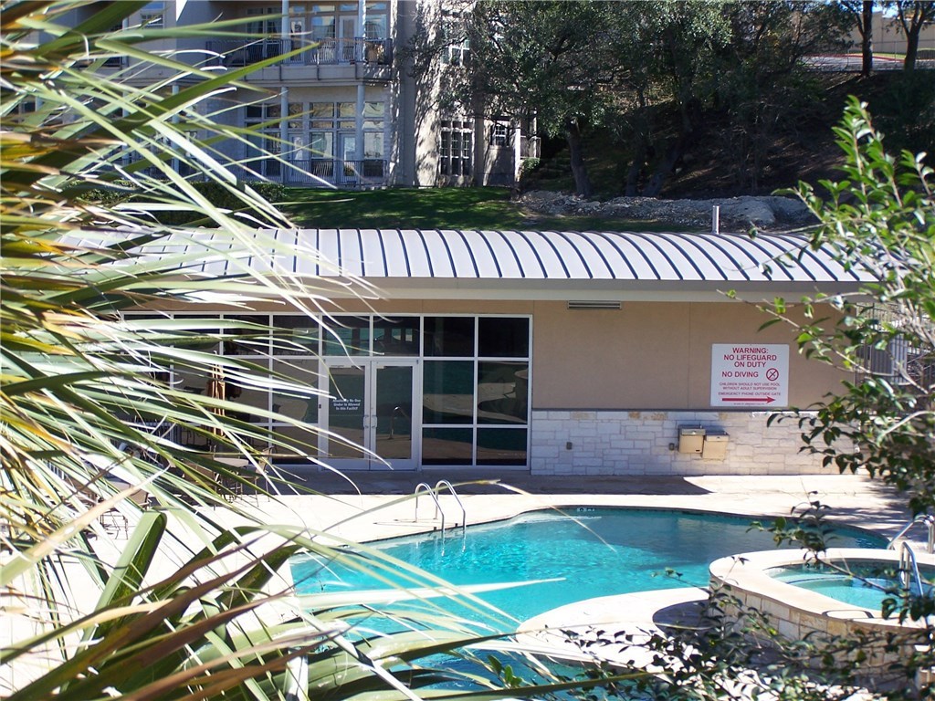 2918 Ranch Road 620 North, Unit L173 Austin, TX 78734 - Photo 28 of 35 Community pool with a hot tub and a patio