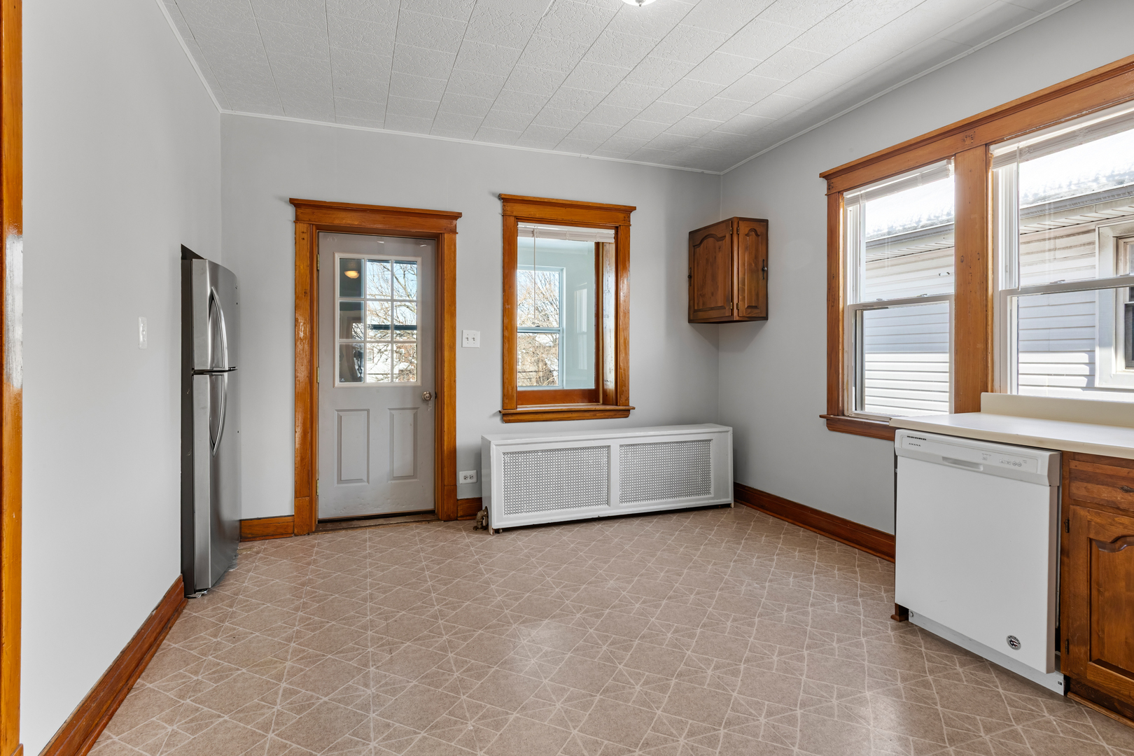 5306 West Roscoe Street, Unit 2 Chicago, IL 60641 - Photo 6 of 12 an entryway at livingroom with furniture and windows