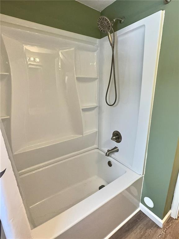 927 Greenhill Road Pittsburgh, PA 15209 - Photo 14 of 41 a bathroom with a bath tub with a shower