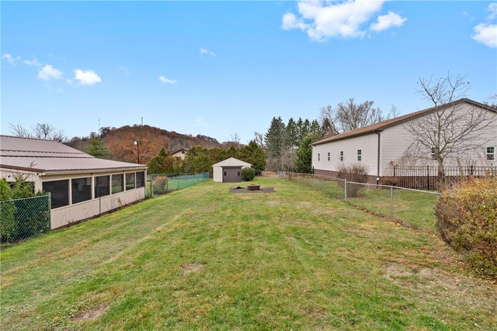 927 Greenhill Road Pittsburgh, PA 15209 - Photo 27 of 41 a swimming pool with trees in the background
