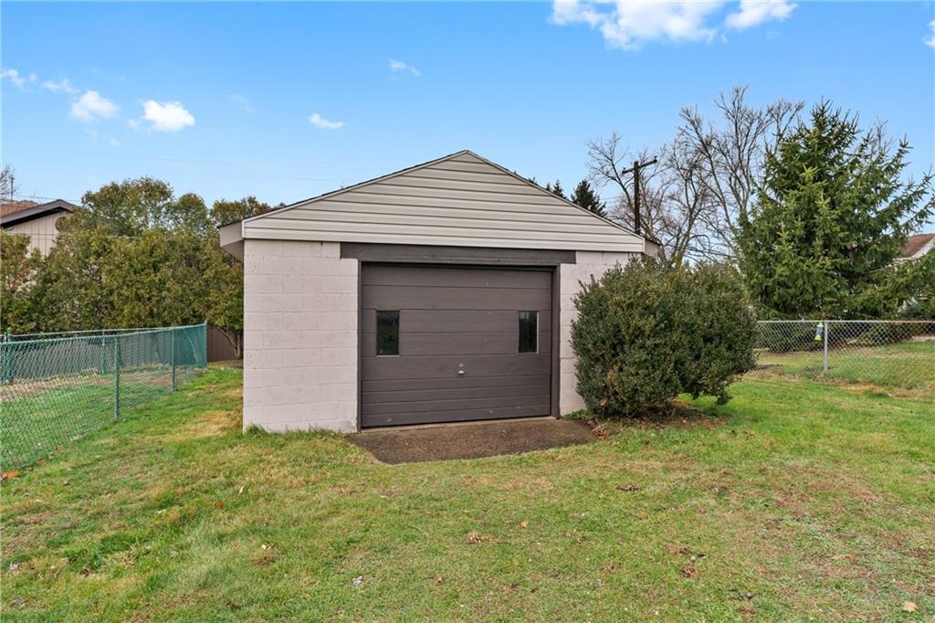 927 Greenhill Road Pittsburgh, PA 15209 - Photo 29 of 41 a house with garden in front of it