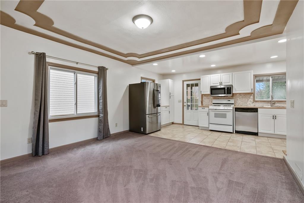 927 Greenhill Road Pittsburgh, PA 15209 - Photo 3 of 41 a view of a kitchen with refrigerator and window