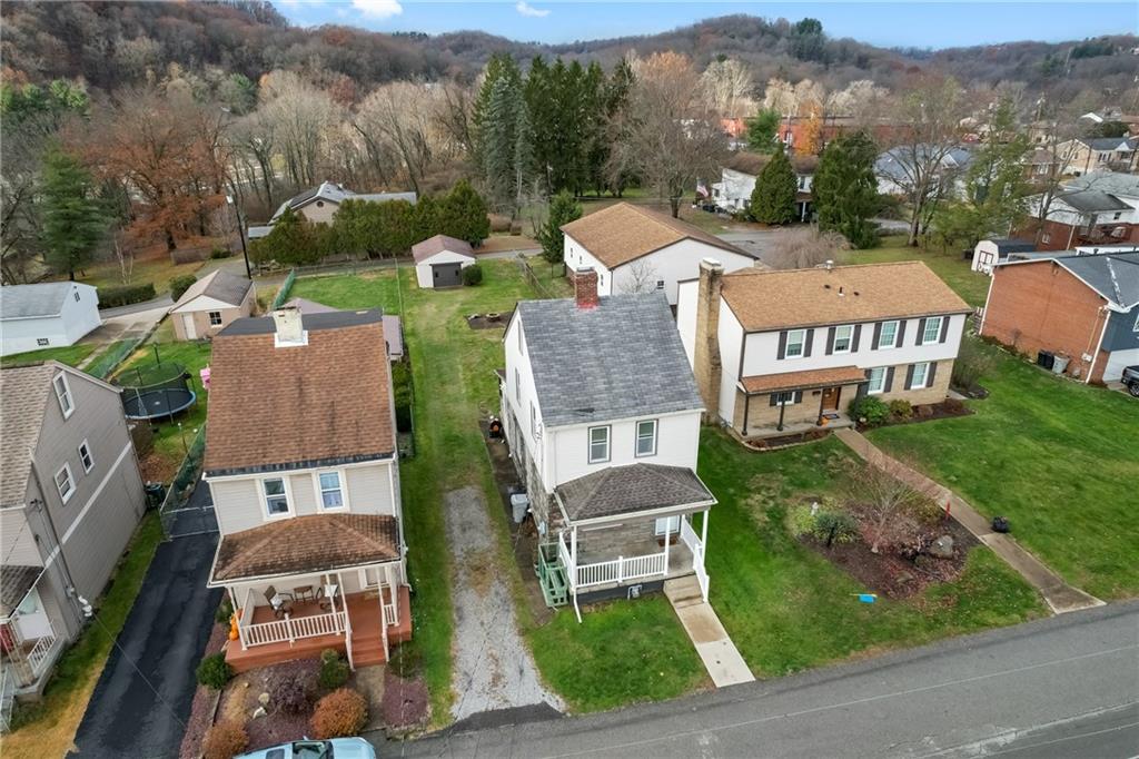 927 Greenhill Road Pittsburgh, PA 15209 - Photo 37 of 41 an aerial view of multiple houses with a yard
