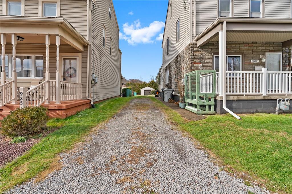 927 Greenhill Road Pittsburgh, PA 15209 - Photo 39 of 41 a view of a house with a yard and pathway