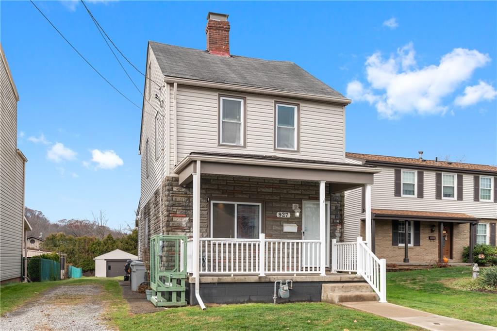 927 Greenhill Road Pittsburgh, PA 15209 - Photo 40 of 41 a front view of a house with a yard