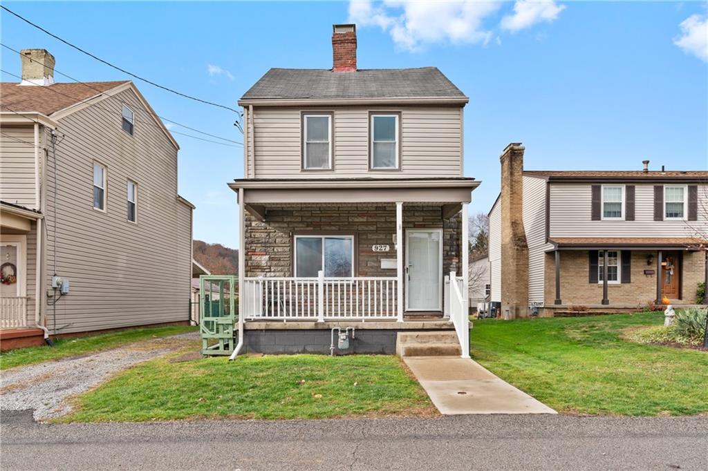 927 Greenhill Road Pittsburgh, PA 15209 - Photo 41 of 41 a front view of a house with a garden