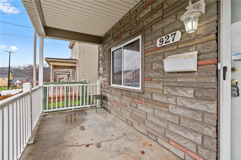 927 Greenhill Road Pittsburgh, PA 15209 - Photo 6 of 41 a view of a brick house with a large window
