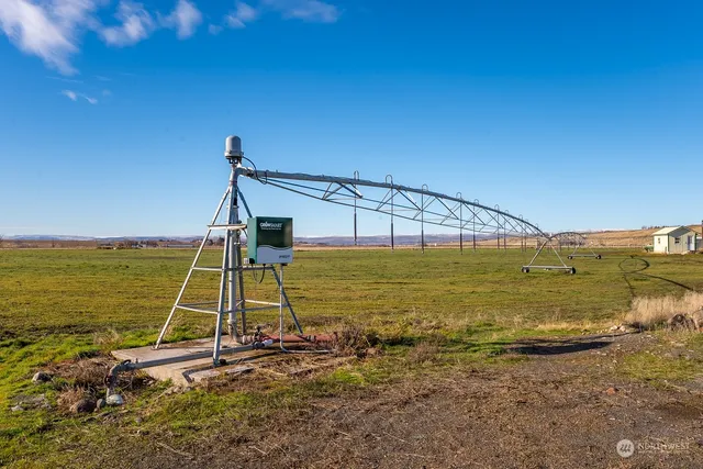 a view of a dining room with furniture and window