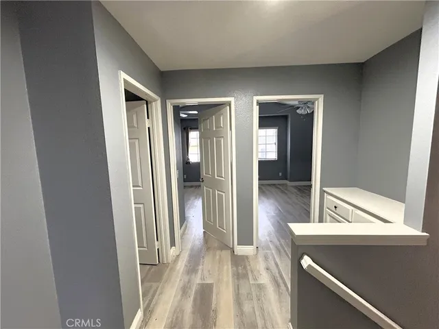 a view of a bathroom from the hallway