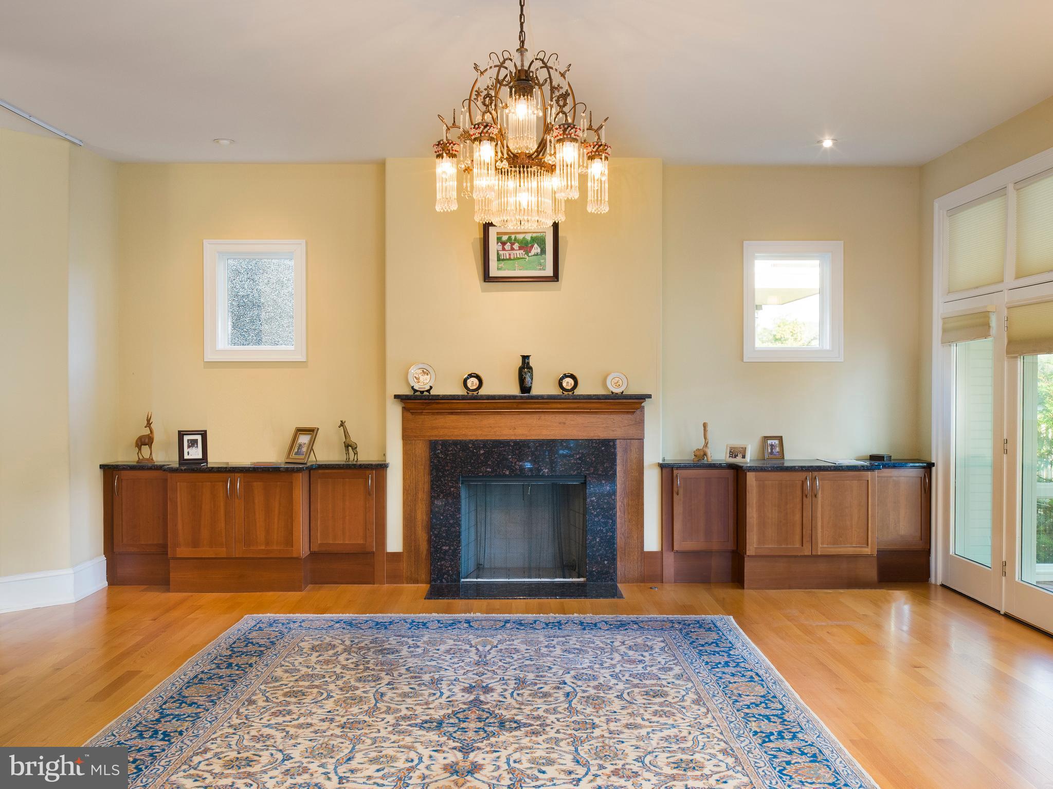 236 River Road Gladwyne, PA 19035 - Photo 13 of 50 a living room with furniture and a fireplace