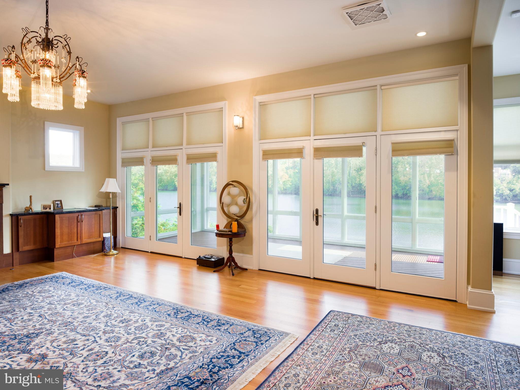 236 River Road Gladwyne, PA 19035 - Photo 14 of 50 a view of an empty room with window and wooden floor