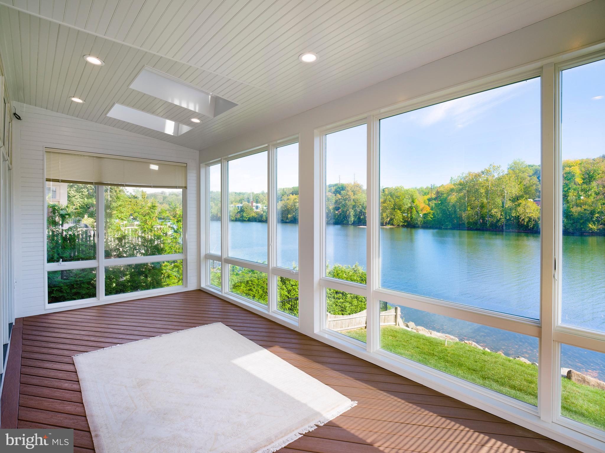 236 River Road Gladwyne, PA 19035 - Photo 20 of 50 a view of a room with large windows and city view