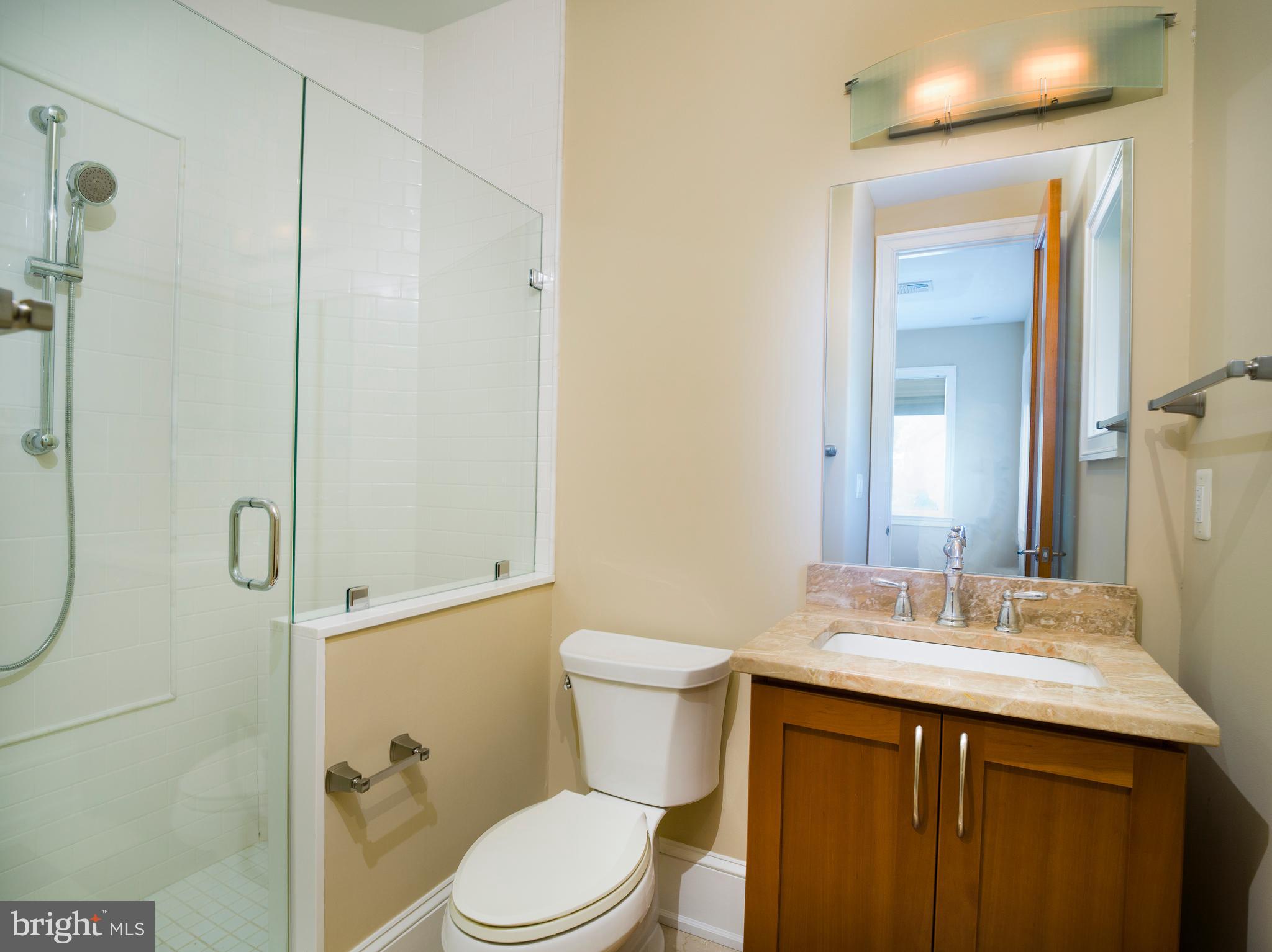 236 River Road Gladwyne, PA 19035 - Photo 38 of 50 a bathroom with a sink a toilet and shower