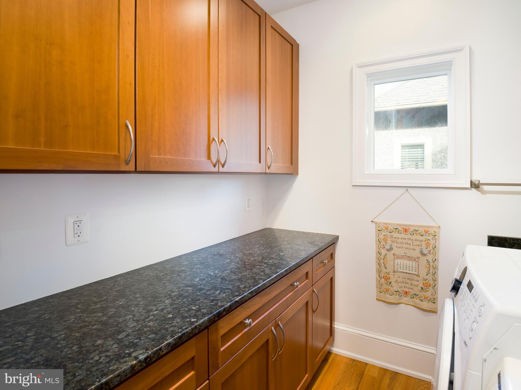 236 River Road Gladwyne, PA 19035 - Photo 40 of 50 a kitchen with granite countertop cabinets stainless steel appliances and a counter top space
