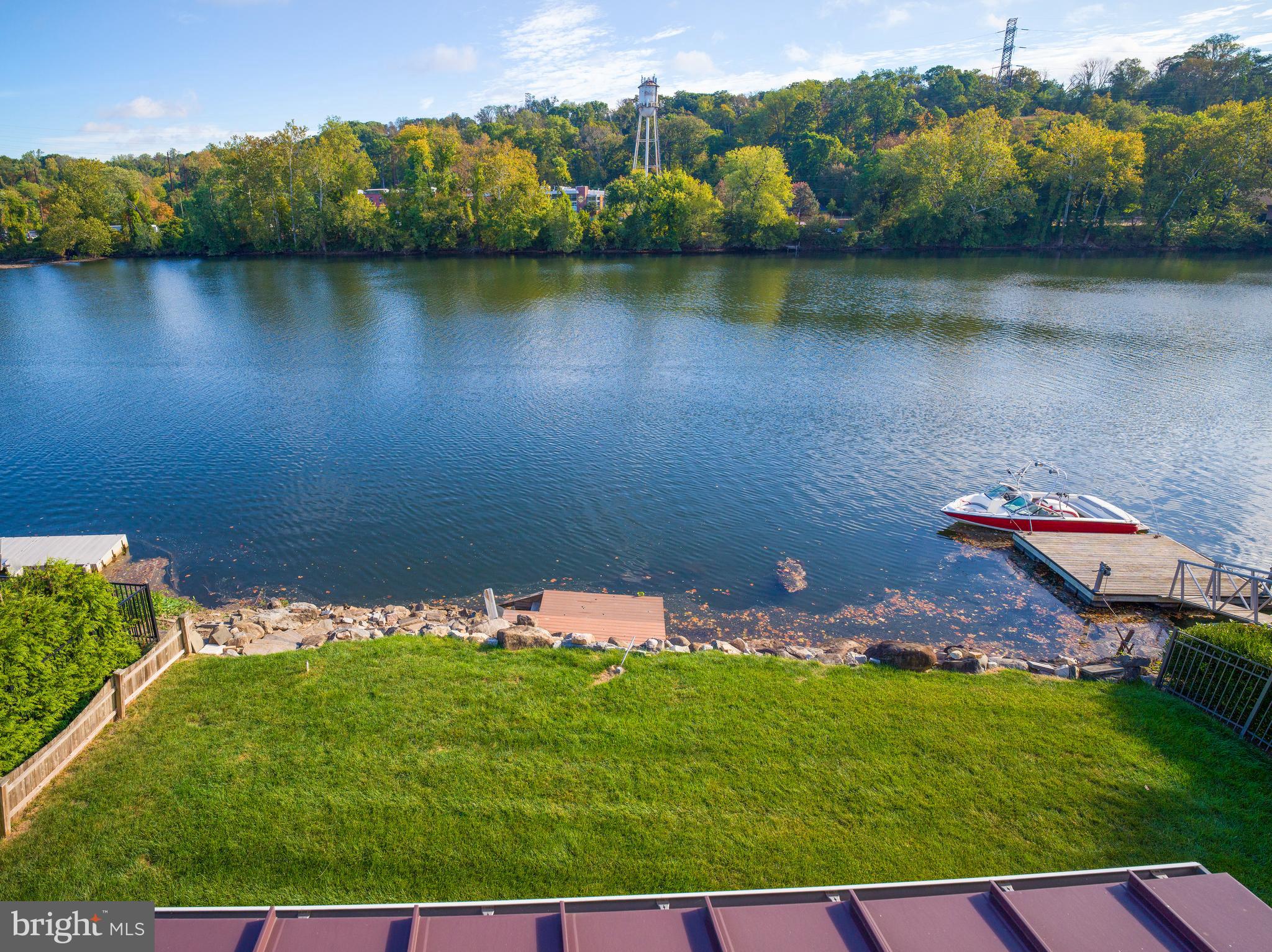 236 River Road Gladwyne, PA 19035 - Photo 45 of 50 an aerial view of a house with a lake view