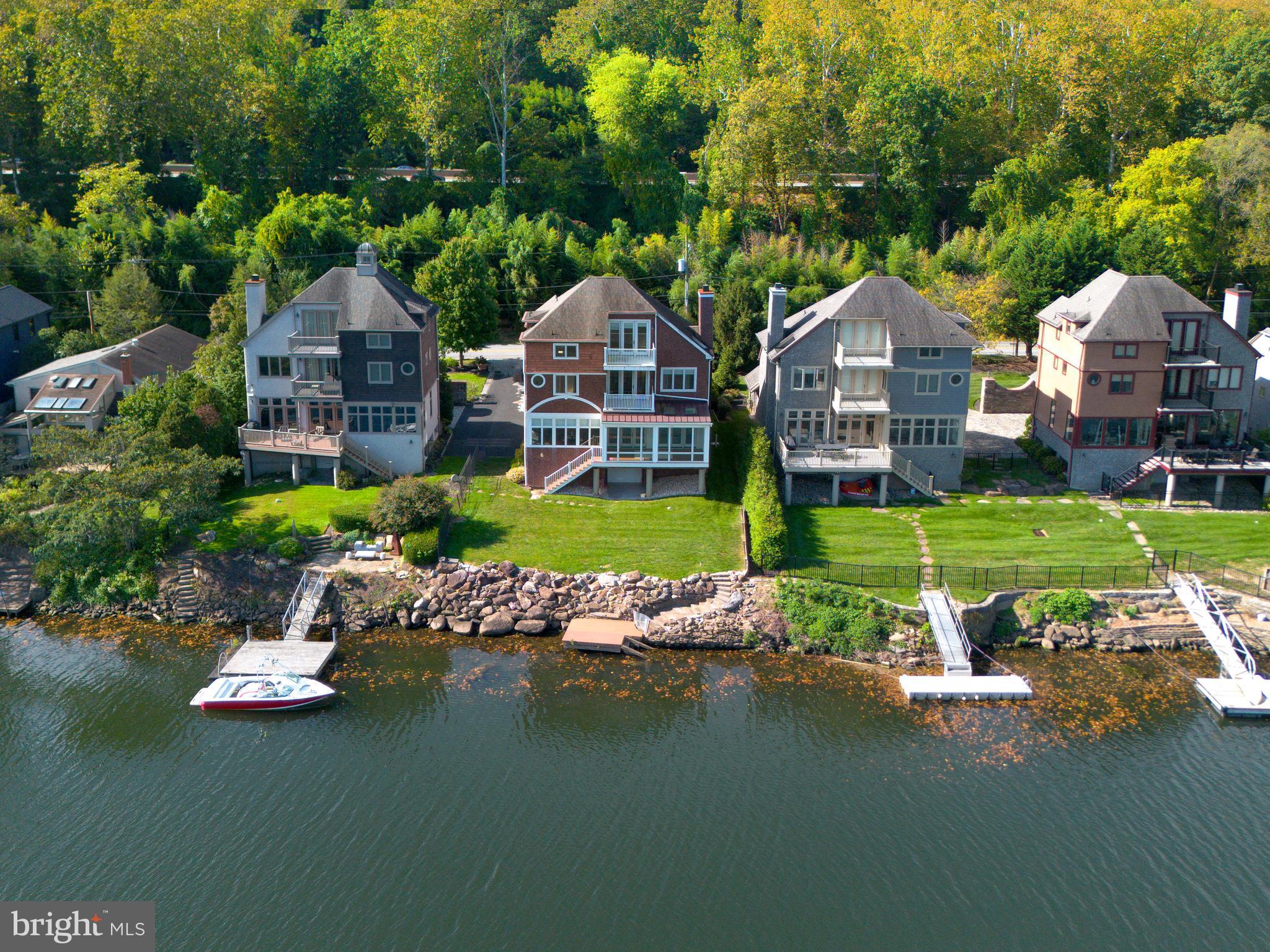 236 River Road Gladwyne, PA 19035 - Photo 7 of 50 a view of a house with swimming pool and a yard