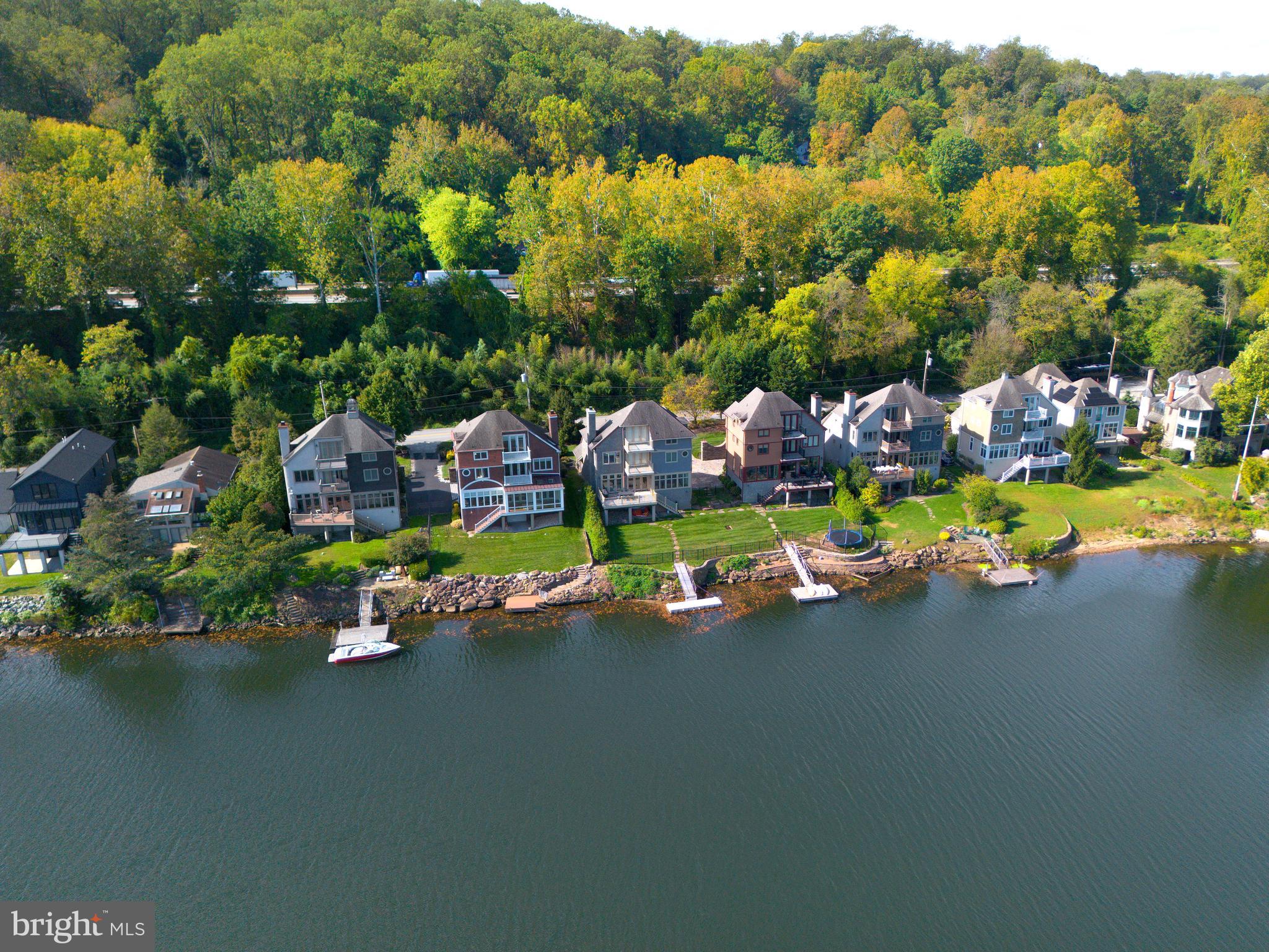 236 River Road Gladwyne, PA 19035 - Photo 9 of 50 an aerial view of a houses with a lake view
