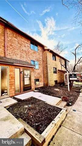 a view of a porch with wooden floor and fence