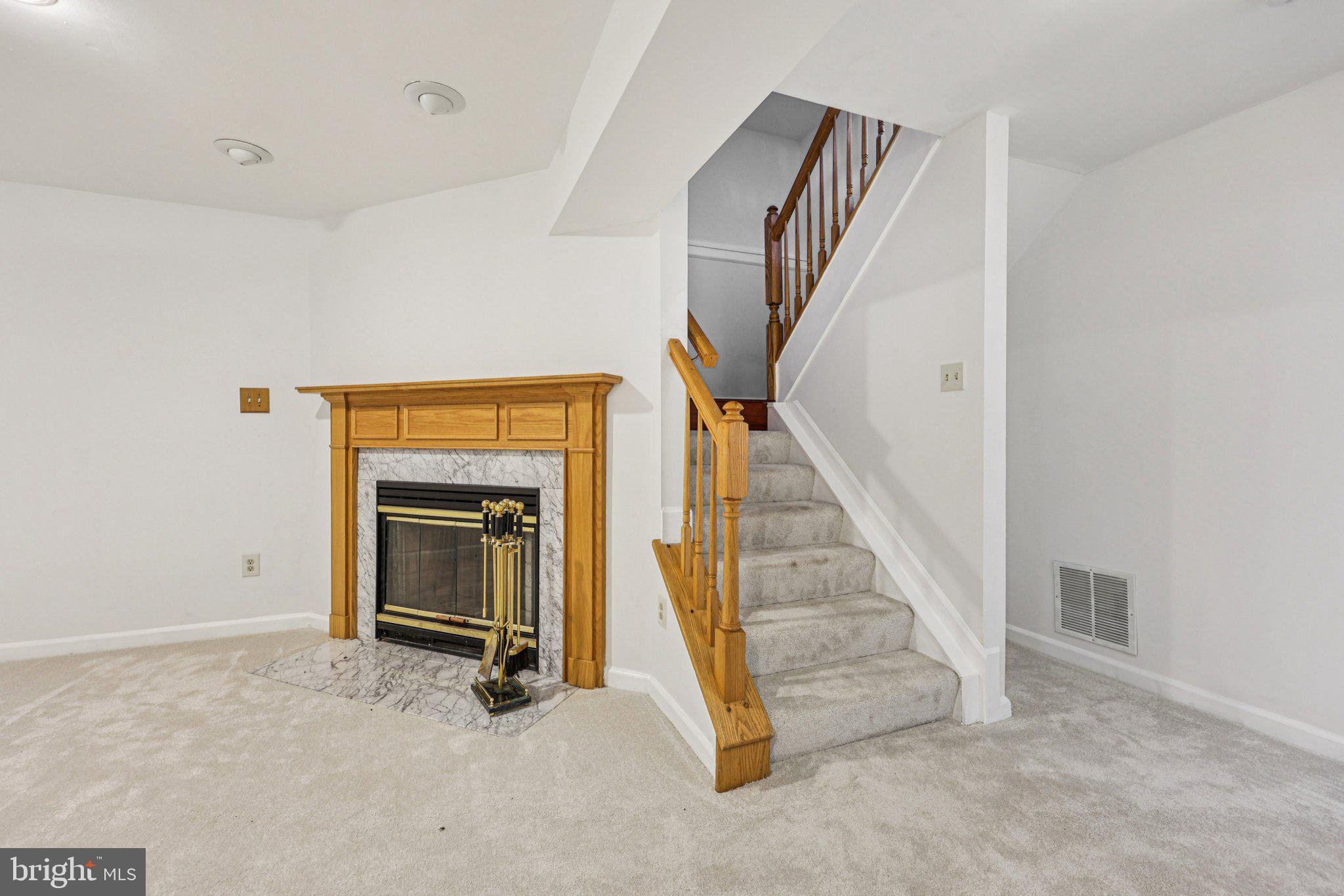 43494 Postrail Square Ashburn, VA 20147 - Photo 11 of 38 a view of a livingroom with stairs