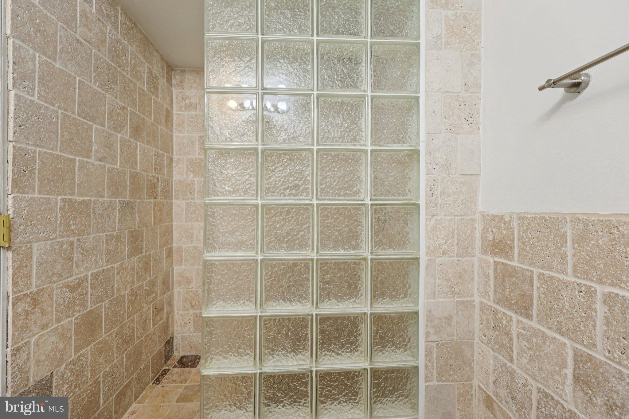 43494 Postrail Square Ashburn, VA 20147 - Photo 19 of 38 a bathroom with a shower