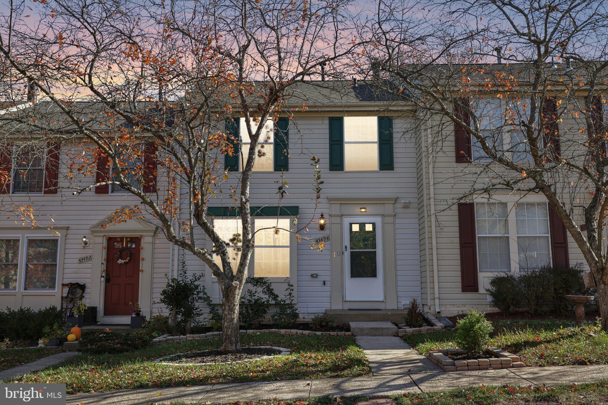 43494 Postrail Square Ashburn, VA 20147 - Photo 38 of 38 a front view of a house with yard