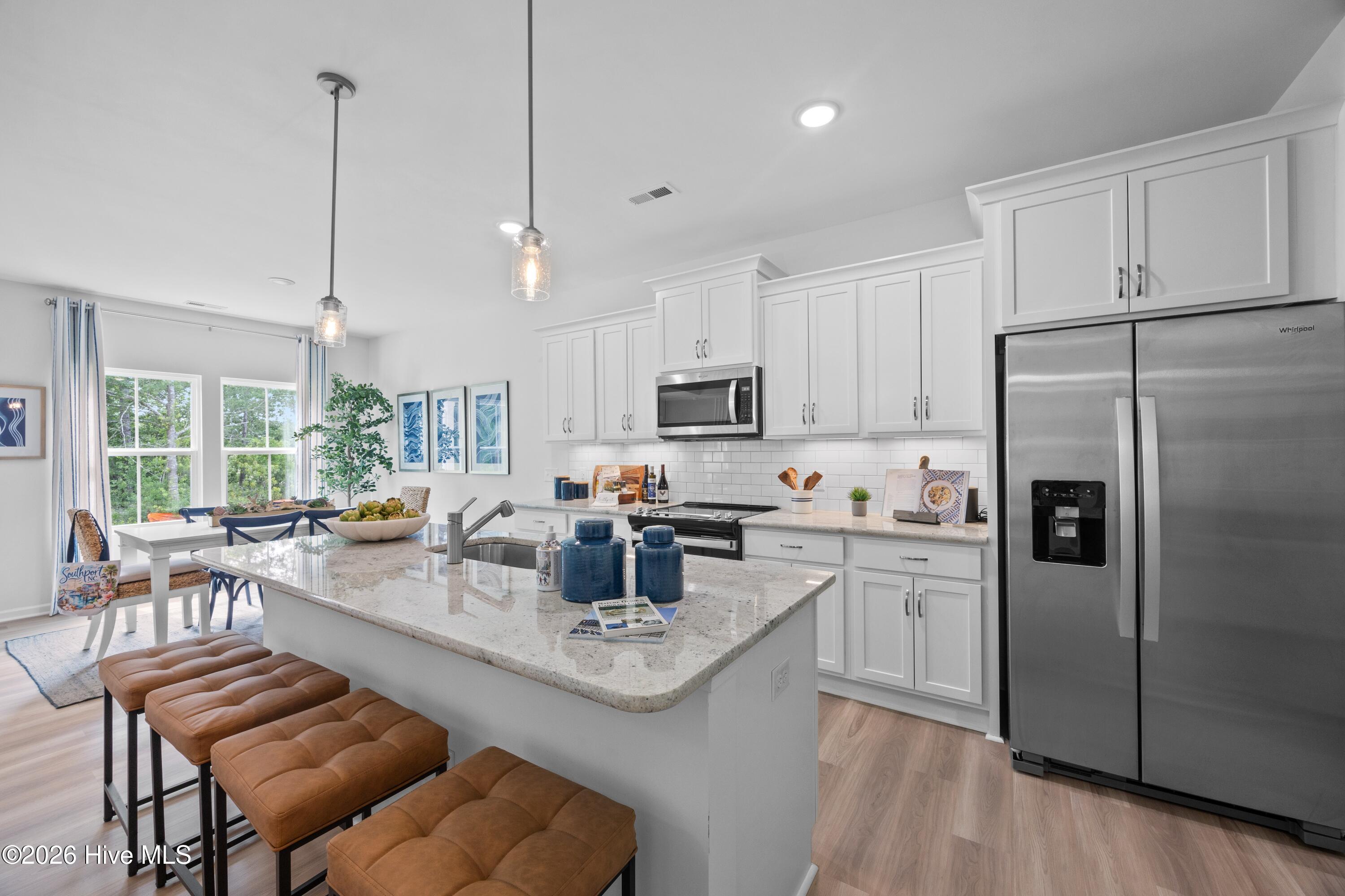 407 Loggerhead Boulevard Hampstead, NC 28443 - Photo 5 of 19 Pebble Kitchen